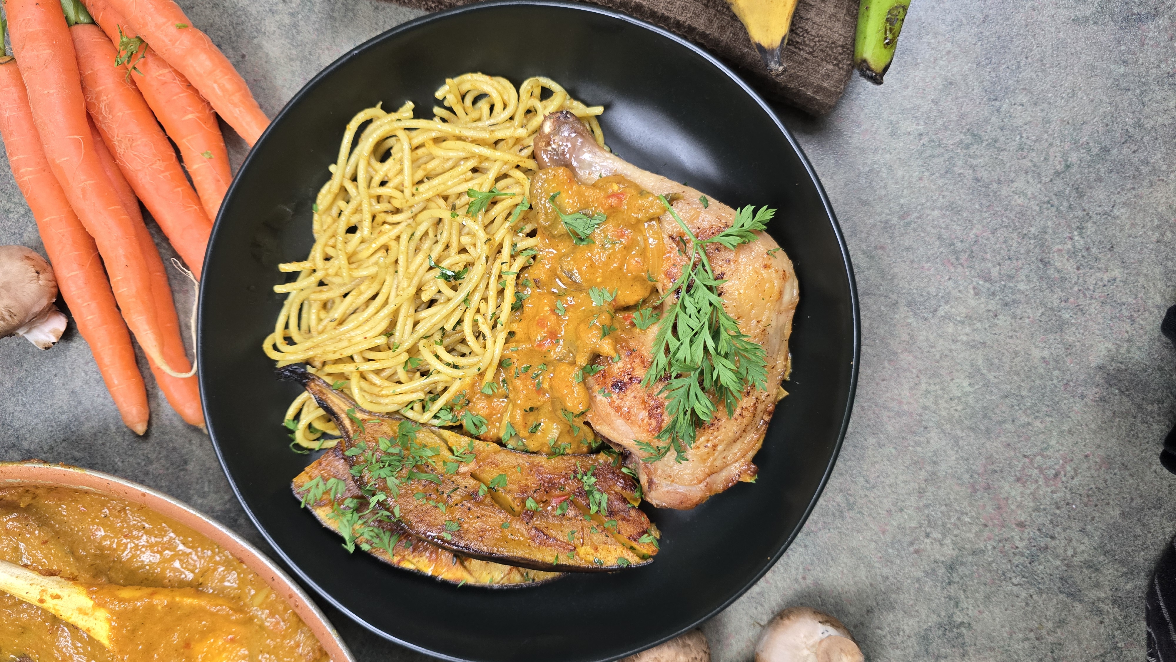 Chef Akinyemi plating a dish